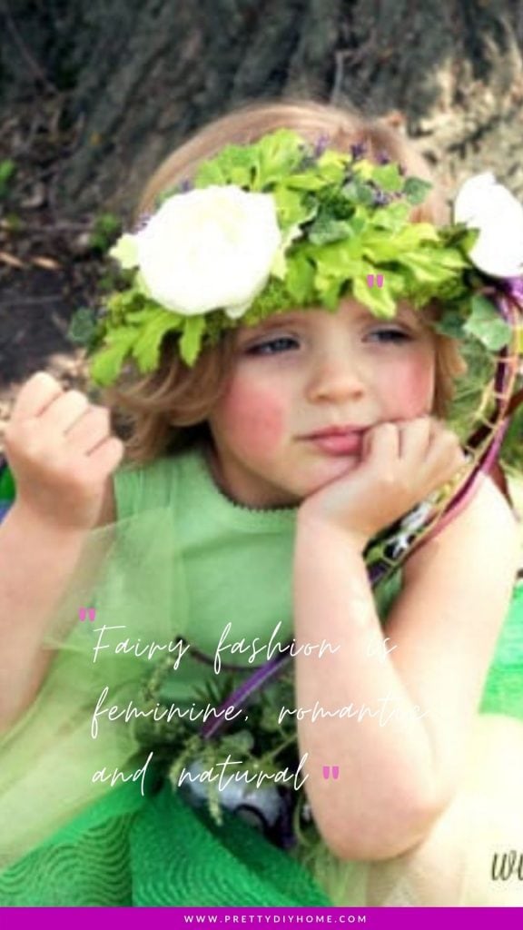 A little girl sitting in front of a tree wearing a woodland fairy crown.