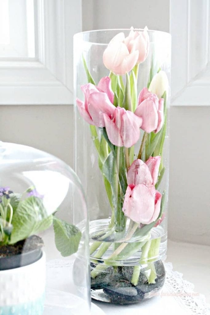 Tulips inside vase done with fresh tulips. A diy spring tulip arrangement .