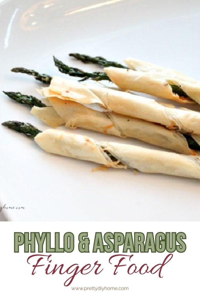 Asparagus rolled inside a strip of phyllo pastry thats been baked golden brown.