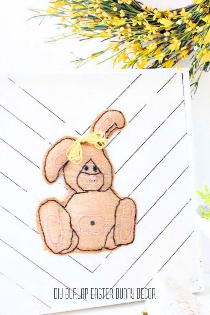 A handmade diy easter bunny wall art craft made with burlap.