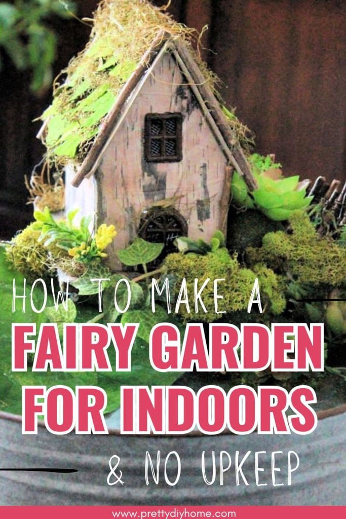 A mini fairy garden with a birch bark covered fairy house, moss covered rocks, small green plants and a water feature diy pond.