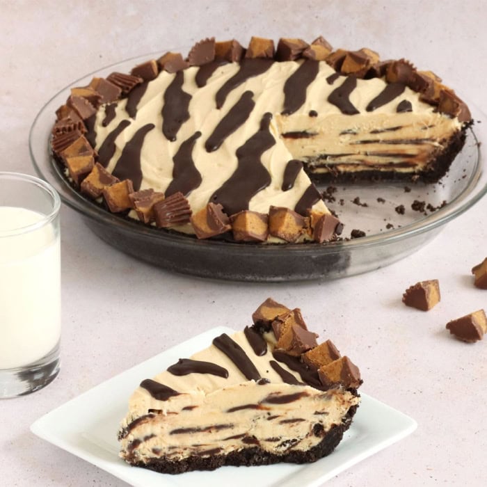 A no bake peanut butter pie with chocolate tiger stripes.