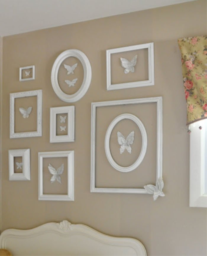 A DIY wall art idea using paper butterflies and upcycled picture frame.