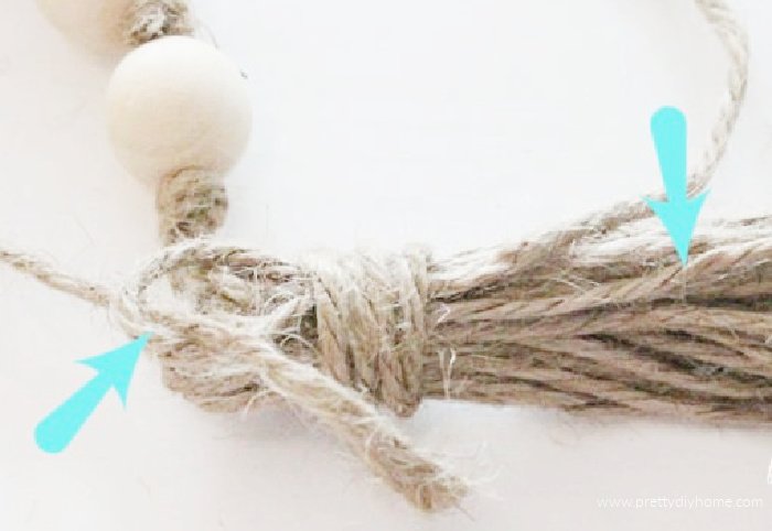 Making the loops for tying a tassel on a DIY Christmas Gift idea