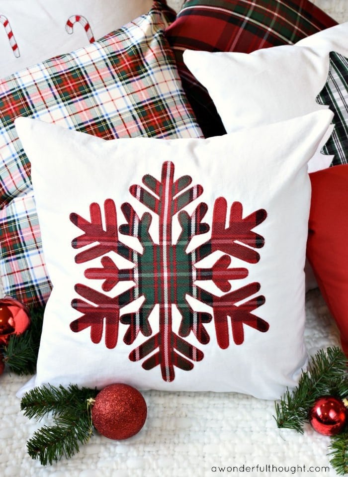 Traditional Christmas style DIY cushion in white with an appliqued plaid cushion.