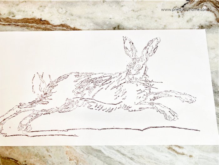 A vintage rabbit illustration on a cream colour card stock. The empty sections will be coloured in with brown marker. A spring diy for adults that can be used for DIY spring decoration.