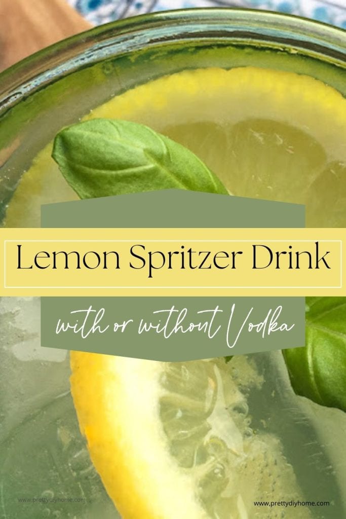 The top side view of a lemon spritzer cocktail showing a slice of lemon, sprig of mint and ice cubes. The image says Lemon Spritzer drink with or without vodka.