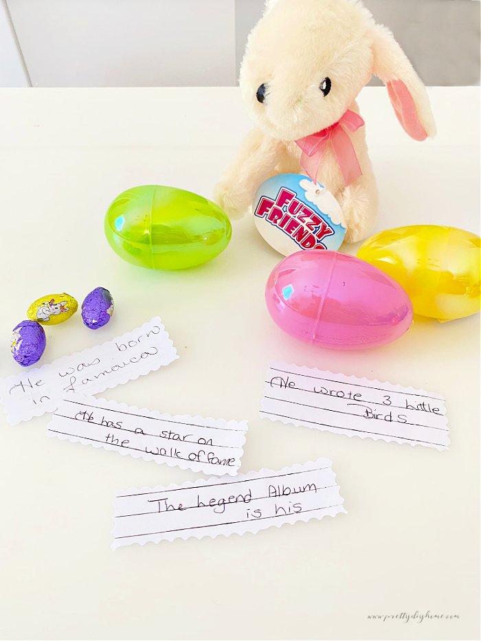 Putting together plastic Easter eggs with little slips of paper that have clues on them.