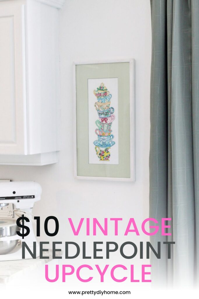 A vintage needlepoint thrift store find thats been cleaned and frame updated for a cottage core look.  The needlepoint is a stack of colorful teacups.