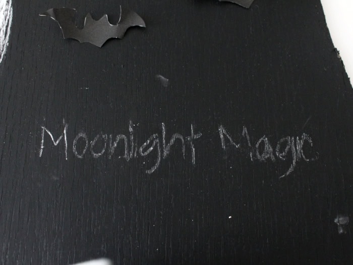 Moonlight magic being transferred to a Halloween chalkboard, it has not be traced in gold chalk pen yet, its just the transfer chalk.