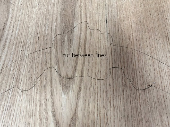 1/4 inch playwood with the outline of a frame both the outside and the inside.