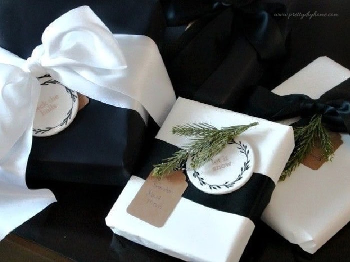 Elegant Christmas gift wrapping ideas with black and white paper and real satin ribbon.