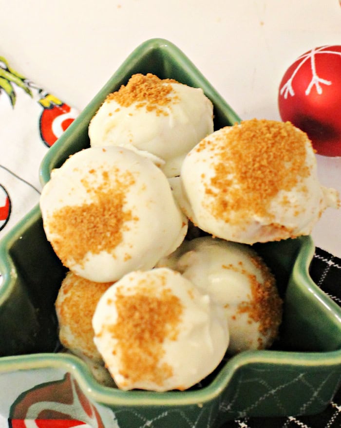 Close view of creamy white coated gingerbread truffles ready to serve.