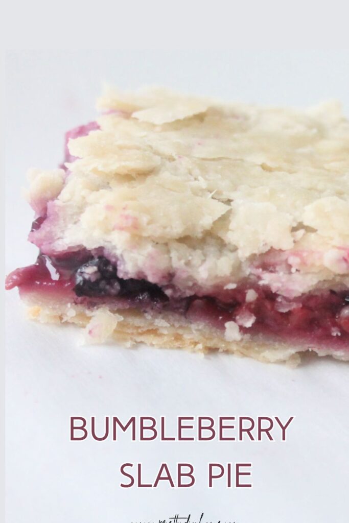 Bumbleberry slab pie finger with flaky crust and mixed berry filling, made with fresh or frozen berries
