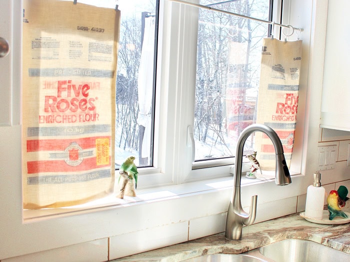 Five Roses flour sacks used as kitchen curtains over sink