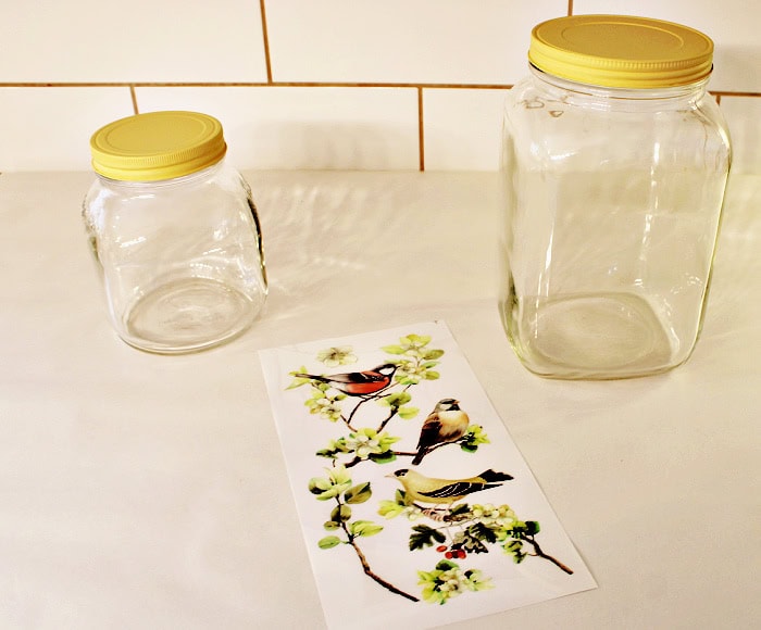 Painted jars with lids painted and bird transfer ready for application.