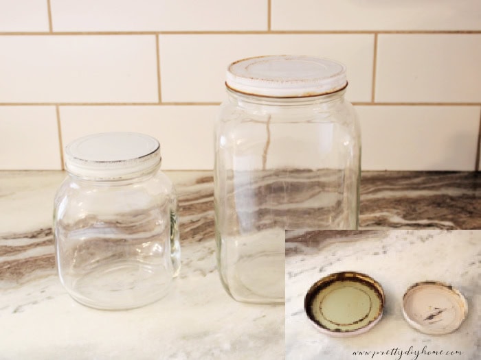 Two vintage glass jars with white lids before painting, with inset showing rust on lid underside