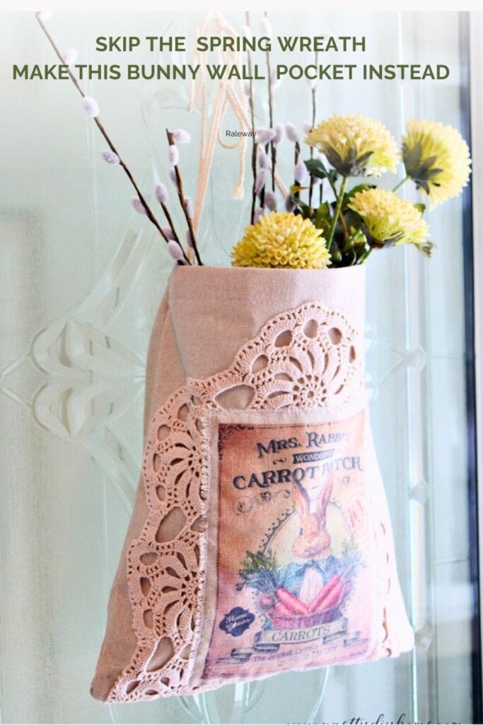 Skip the spring wreath and decorate your door with this DIY bunny wall pocket filled with yellow flowers and pussy willows.