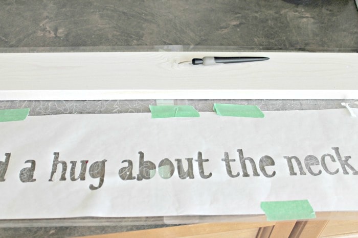 How to stencil letters on a wood DIY farmhouse sign for kids. Cutting the lettering using a Silhouette.