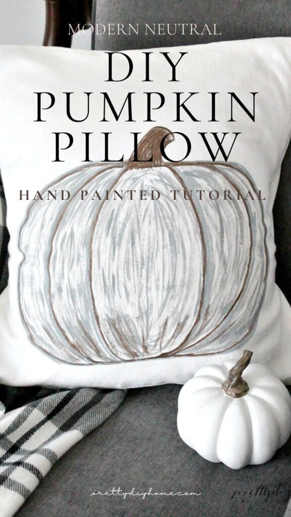 DIY pumpkin pillow with a hand painted neutral pumpkin design for fall decor.
