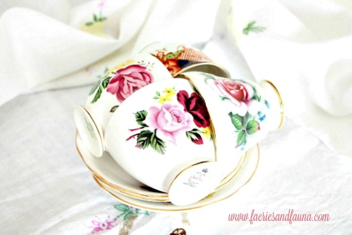 Pretty antique teacups with flowers for a Three tier tray for spring, How to decorate a tiered tray with items you already have.