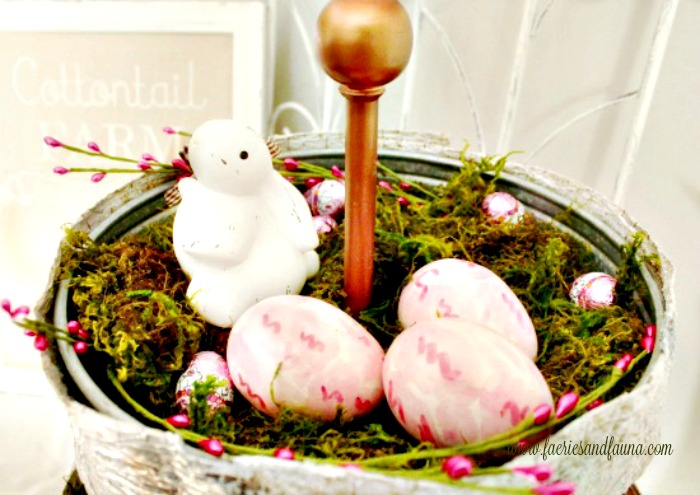 A Spring tray decorated with a bunny , Easter eggs and moss. Simple and easy Spring decor ideas with items from around your home.