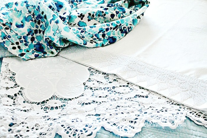 Lace edging on homemade pillow cases for the guest room. How to make standard pillowcases beautiful enough for guest room.