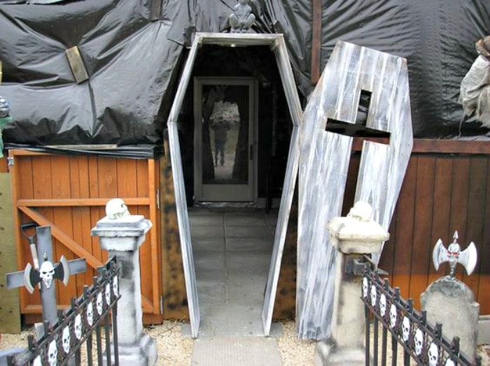 Very spooky Halloween porch of a coffin. DIY Halloween front porch ideas, Halloween porch displays, DIY Halloween yard decorations, DIY Halloween front porch ideas, DIY Halloween front door decorations, 