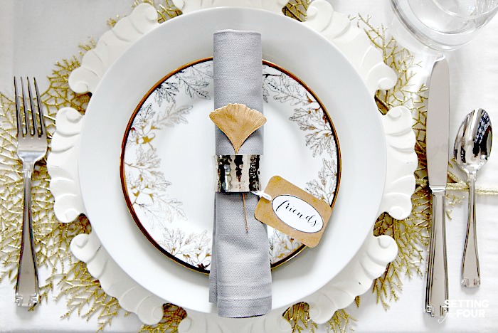 Elegant fall decor tablescape with brilliant white dishware.