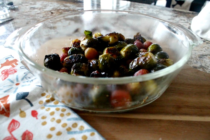 Roasted brussel sprout recipe serve in a clear oven dish for thanksgiving