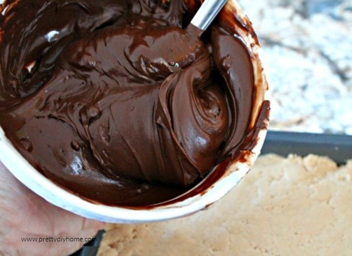 Melted chocolate before being added to a chocolate peanut butter bar recipe.