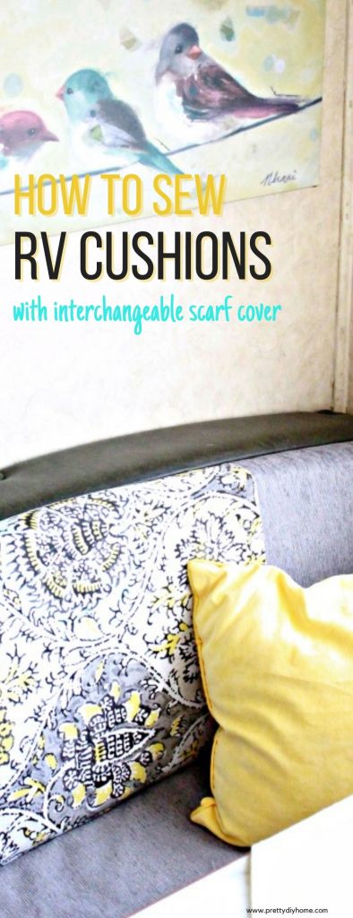 A closeup of a RV dinette table with DIY RV cushion covers with an interchangable scarf for added colour, and a yellow cushion.