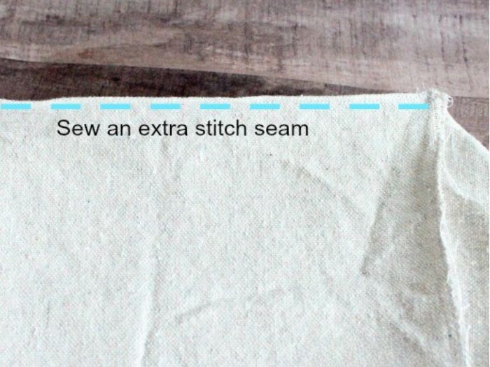 An extra seam is sewn along the bottom edge of the fabric liner to add structure.