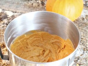 A no bake pumpkin cheesecake filling in a large bowl.