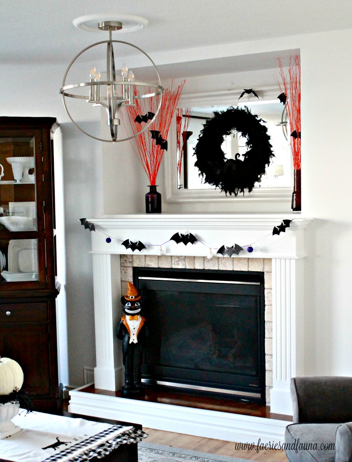 DIY Halloween Fireplace mantel decorated with Halloween craft ideas.