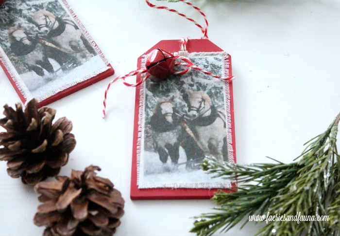 Handmade DIY Christmas ornament in red with white fabric and horses.