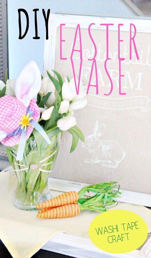 A glass vase with washi tape Easter bunny nose and whiskers with fresh flowers for Easter