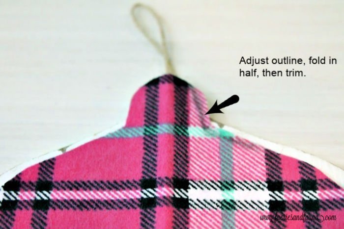 How to make your own flannel and wood Christmas tree ornaments with pink plaid.