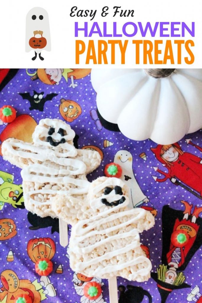 Rice krispie Halloween treats for kids. Little ghost mummies covered in white chocolate and served on sticks.