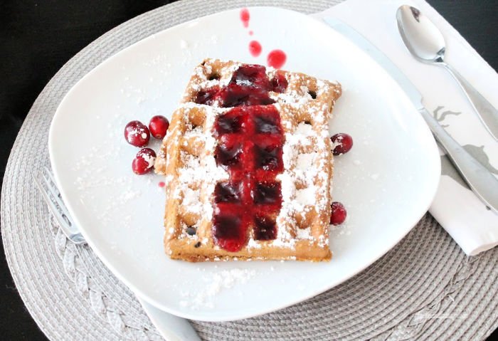 Homemade Cranberry syrup recipe served on waffles