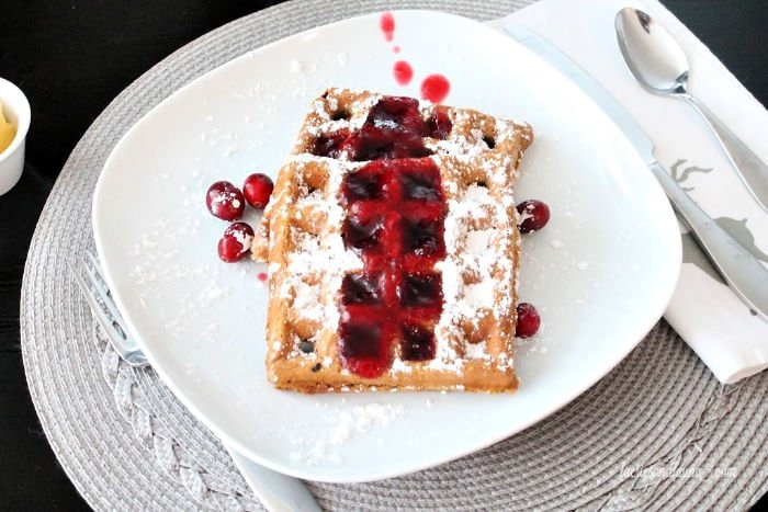 Gingerbread waffles with cinnamon and cranberry syrup.