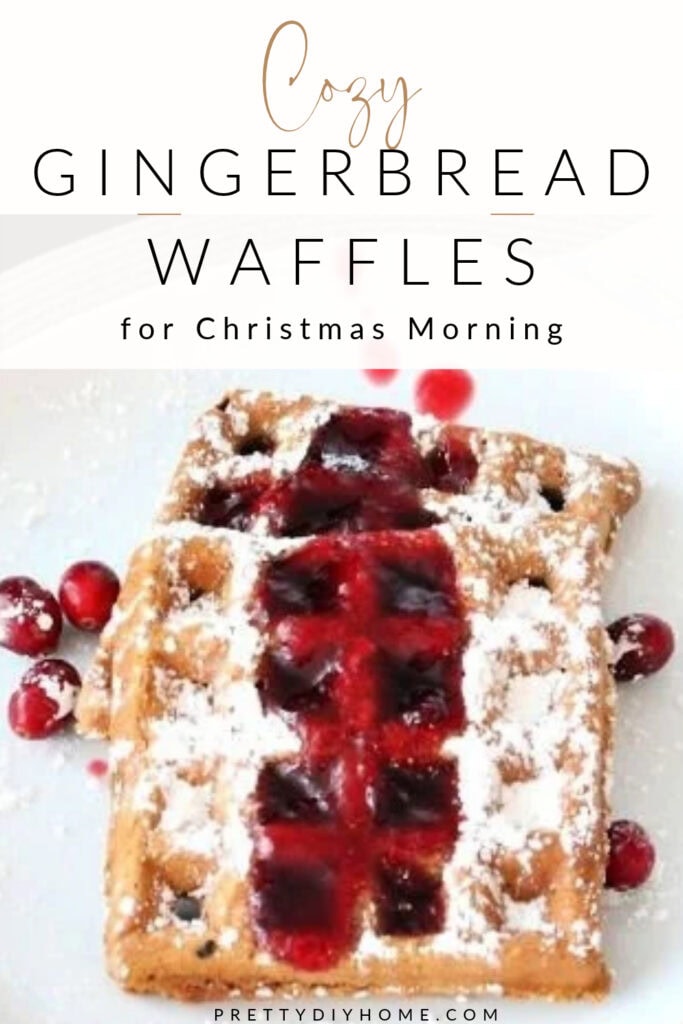 Gingerbread waffles topped with cranberry syrup and icing sugar with text reading Gingerbread Waffles for Christmas Morning.