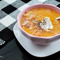 Cabbage soup recipe with kielbasa sausage and optional sour cream.