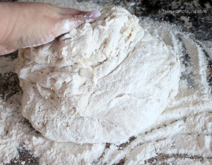 Starting to knead homemade buns or rolls.