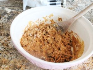 Mixing bran muffin batter for healthy bran muffins.