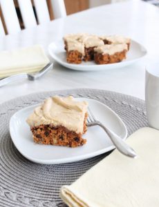 Moist tomato soup cake with raisins, walnuts and brown sugar icing.