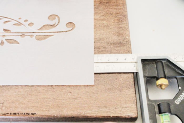 Centering a stencil onto a DIY Farmhouse shelf
