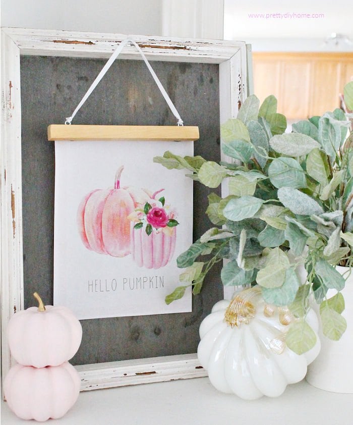 Easy and Inexpensive Neutral Fall Decor with a Free pumpkin printable, diy wood hanger, and white pumpkins.