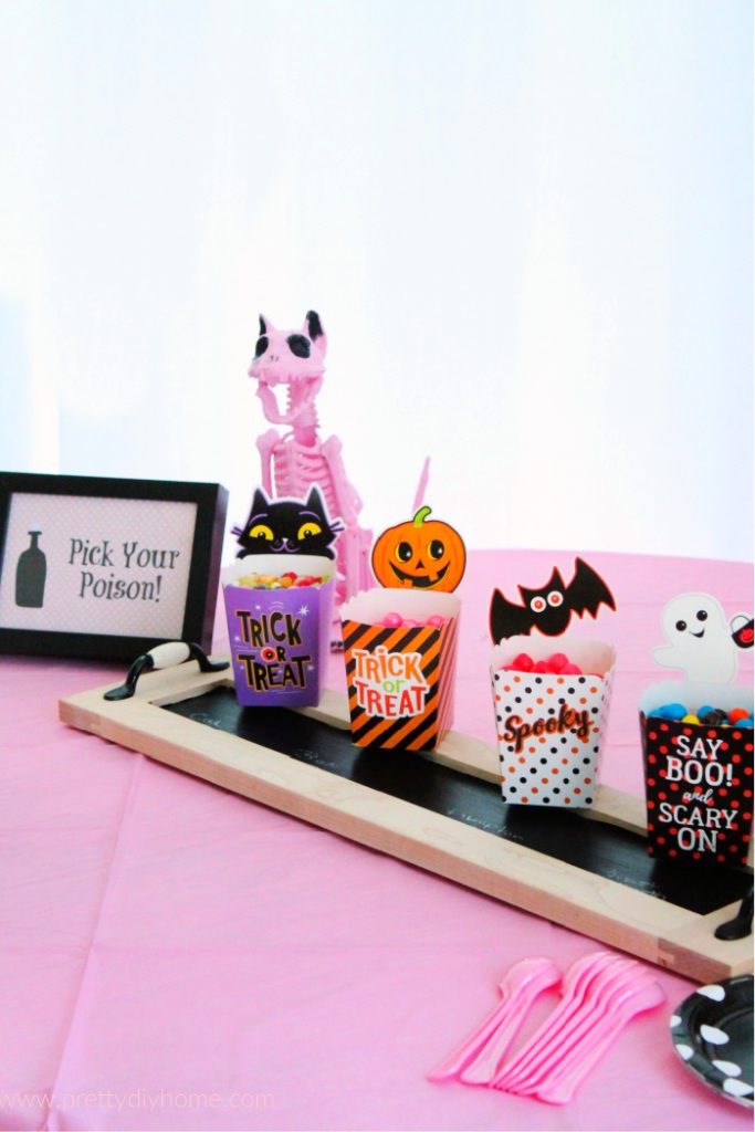 A Pink Halloween Party candy serving idea with a DIY chalkboard tray, and free printable Halloween signs