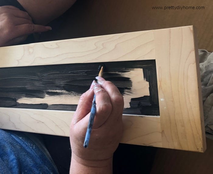 Painting a DIY serving tray with chalkboard paint